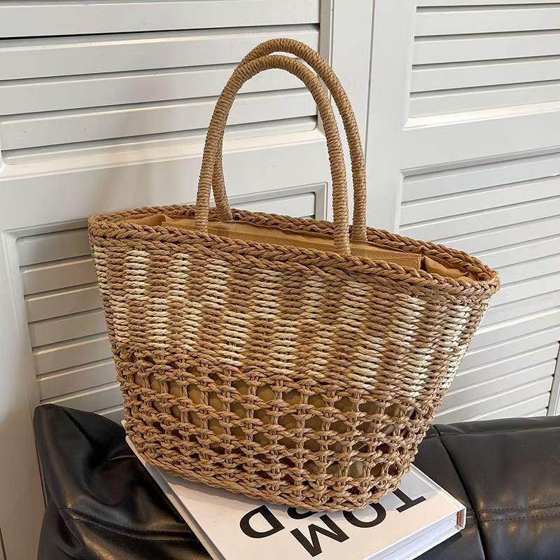 Handwoven basket bag with airy structure Bowlift