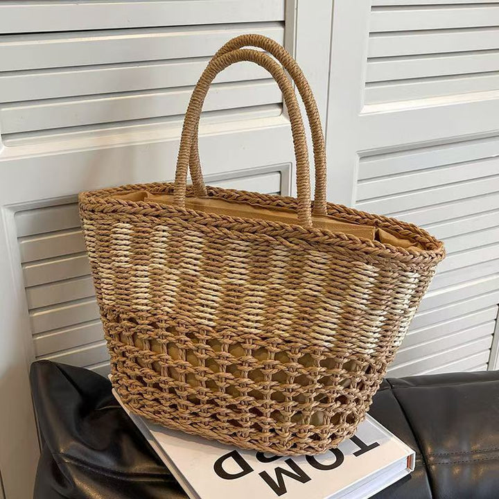 Handwoven basket bag with airy structure Bowlift