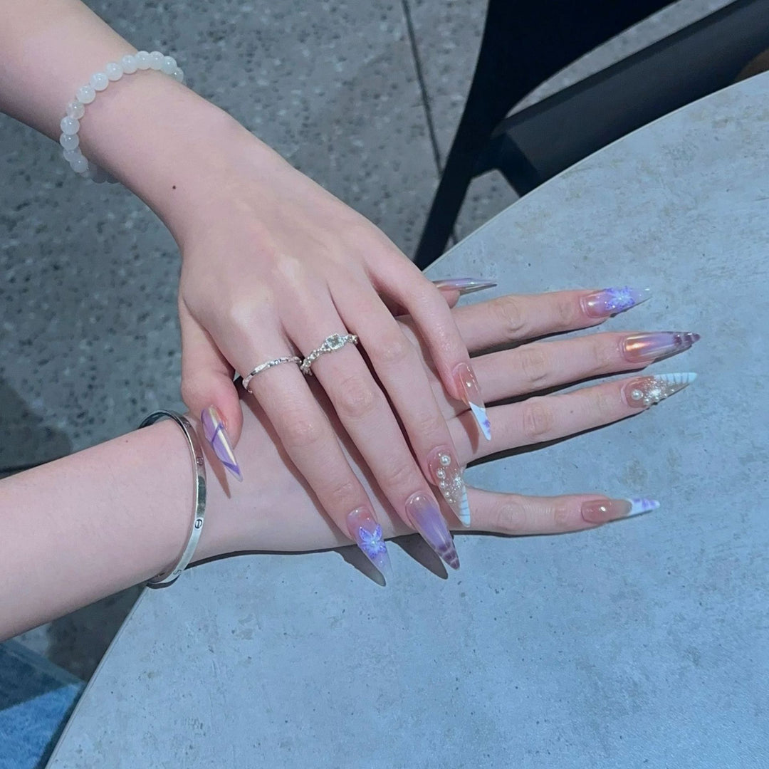 Artistic Stiletto Press-On Nail Design Set with Floral Elements Bowlift