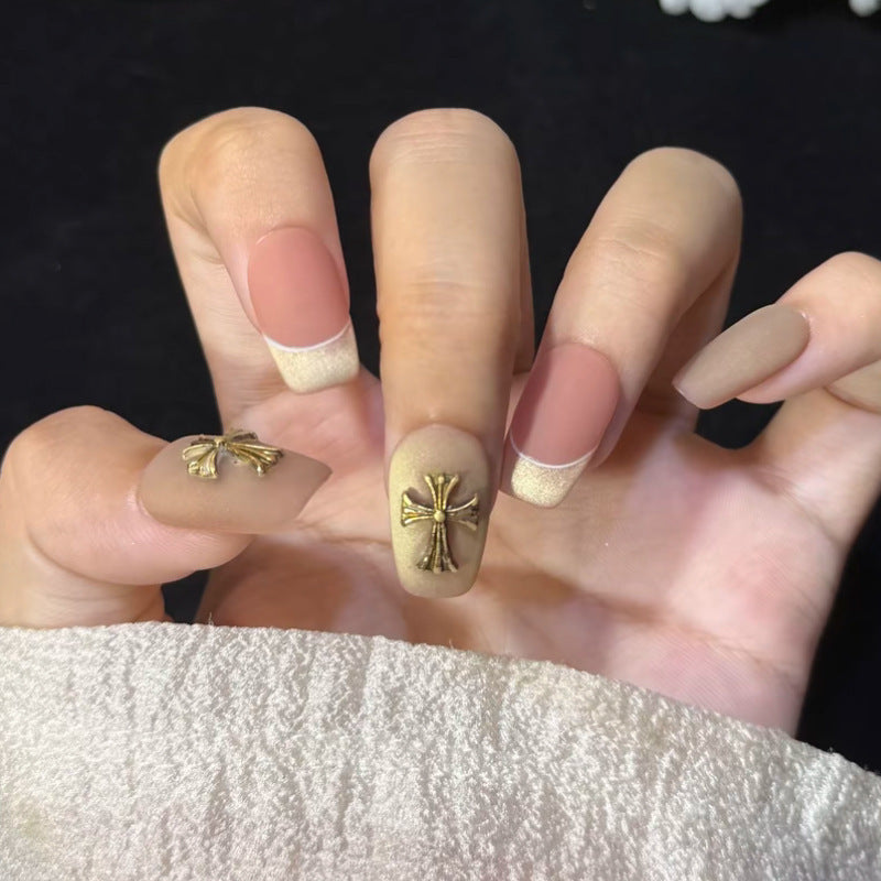 Artificial nail set with festive gift design and elegant glitter accents Bowlift