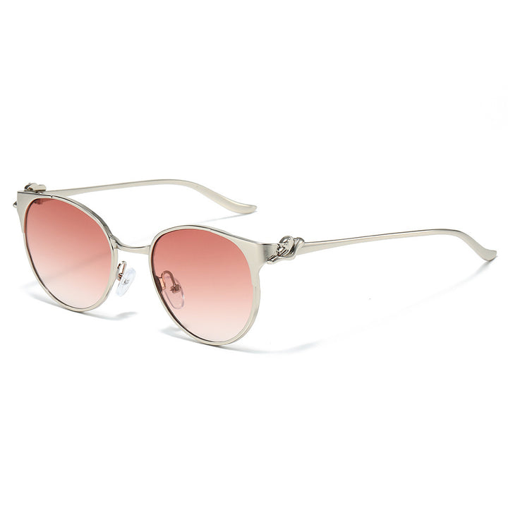 Elegant Cat-Eye Sunglasses with Decorative Gold Accents Bowlift