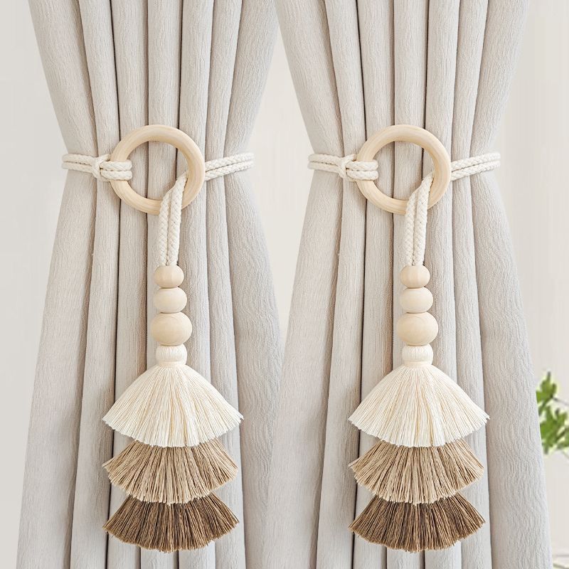 Decorative curtain holder with tassels Bowlift