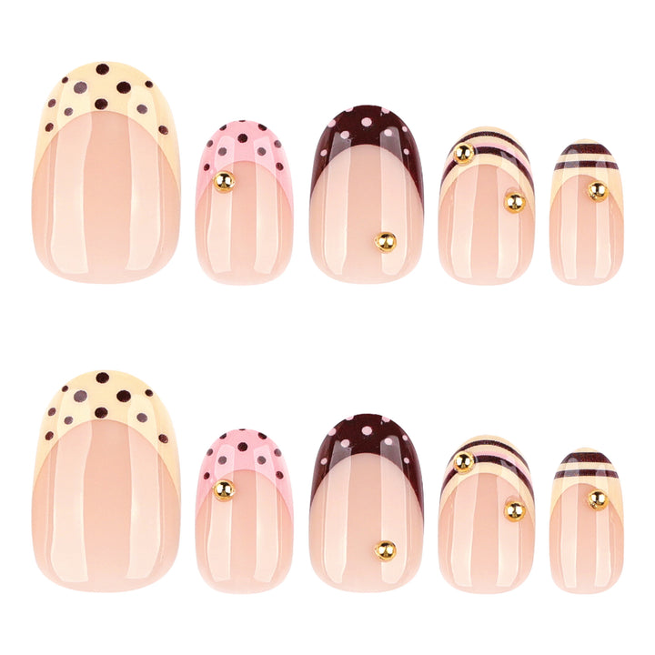 Artful stiletto nails with elegant floral design and glitter details Bowlift