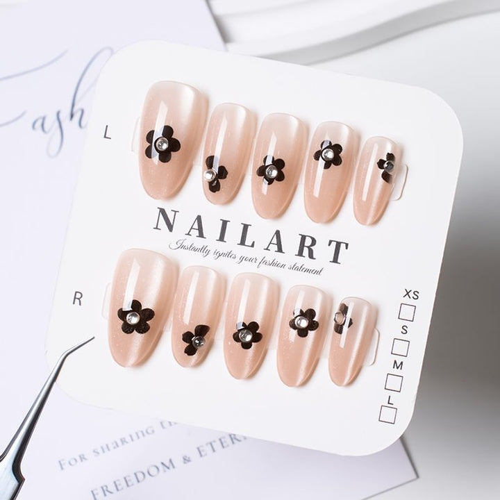 Artificial nails with elegant floral decorations Bowlift