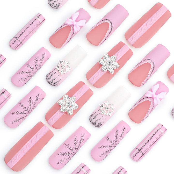 Artful nail extensions with festive decorations Bowlift