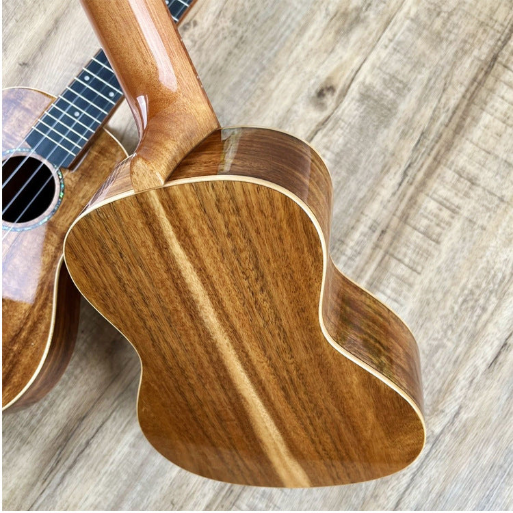 Premium Solid Wood Concert Ukulele Bowlift