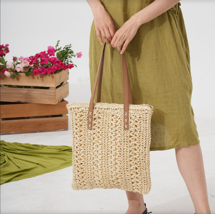 Spacious straw shoulder bag with elegant leather handles Bowlift