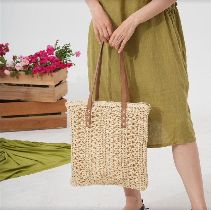 Spacious straw shoulder bag with elegant leather handles Bowlift
