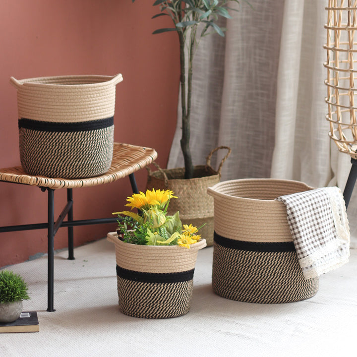 Decorative laundry basket made of woven material Bowlift