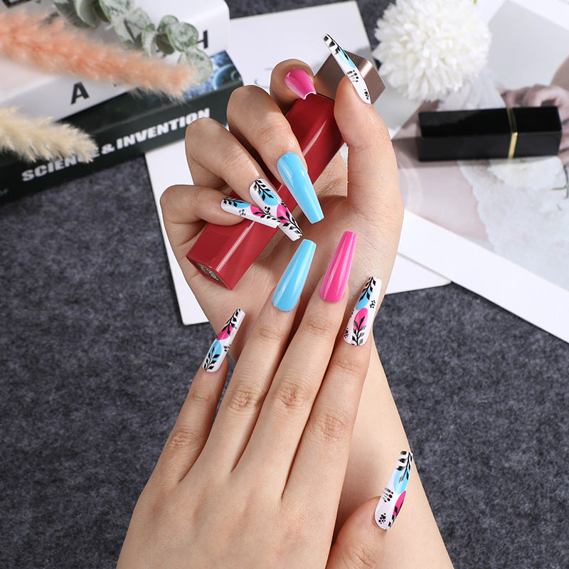 Artificial nails with floral design and creative accents Bowlift