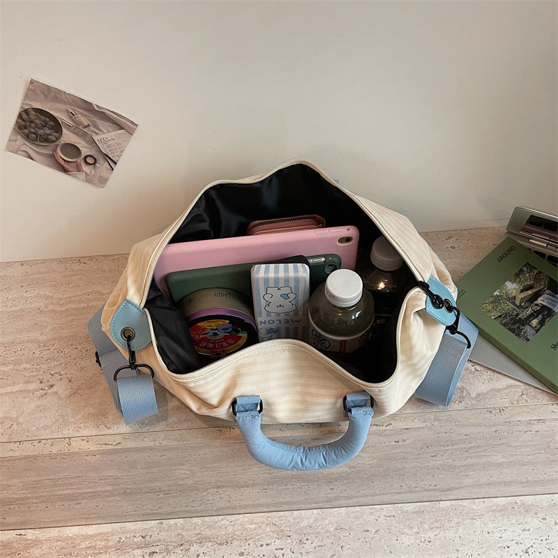 Fashionable Travel Bag with Ergonomic Carrying Strap and Structured Interior Bowlift