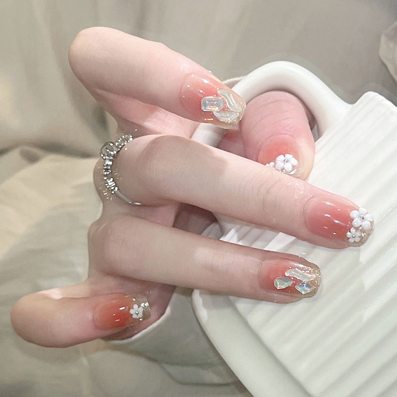 Artificial nail set with floral 3D decorations and elegant glitter Bowlift