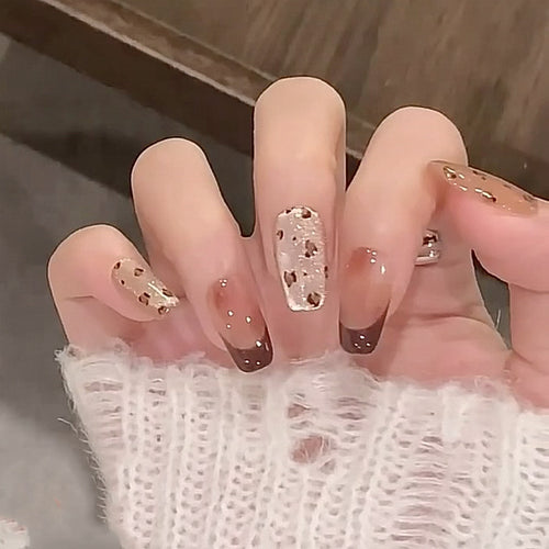 Artistic nail extensions with elegant glitter design Bowlift
