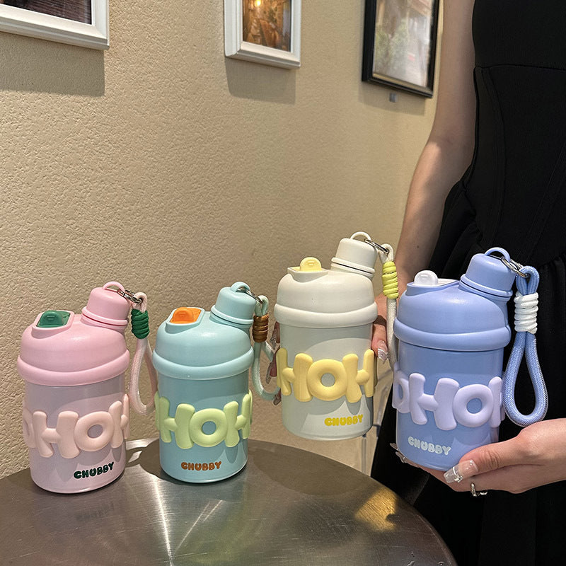 Ladies insulated water bottle with ergonomic carrying handle and cheerful design Bowlift