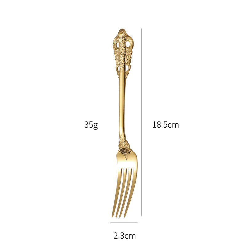 Elegant fish fork with artistic handle design Bowlift