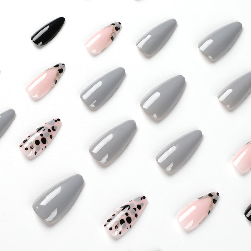 Artful stiletto nails with elegant accent design Bowlift