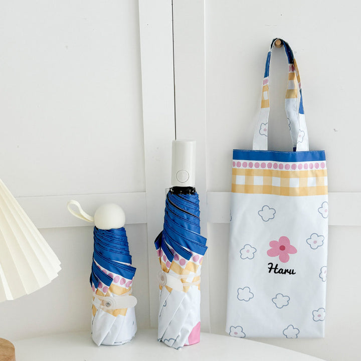 Ladies collapsible umbrella with playful floral pattern Bowlift