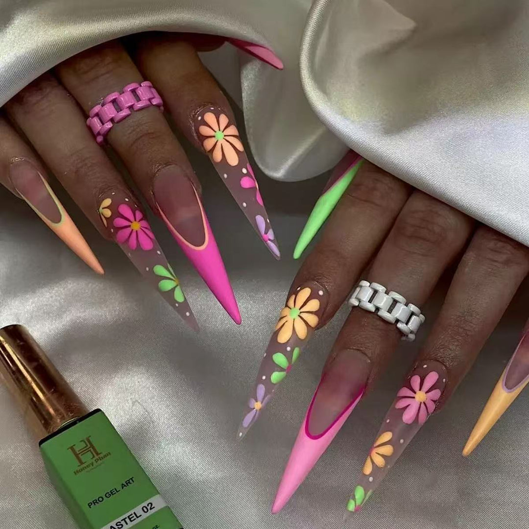 Artificial nail set with playful flower design and elegant high-gloss finish Bowlift