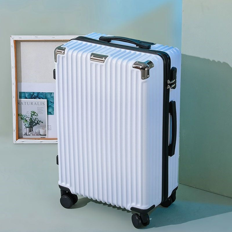 Hard shell suitcase with 360-degree wheel system and integrated safety feature Bowlift