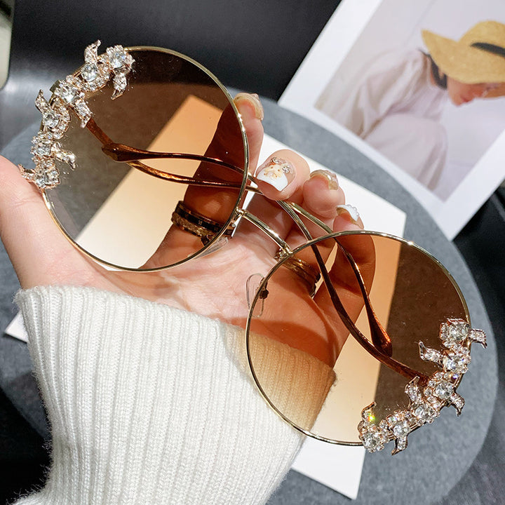 Women's fashion sunglasses with extravagant design and sparkling accents Bowlift