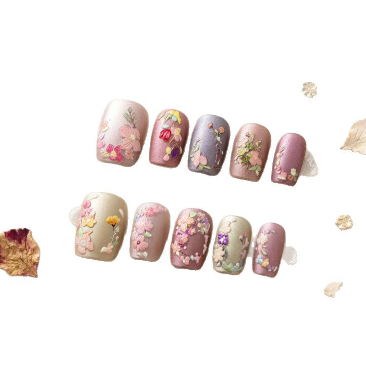 Art nail design with floral motifs Bowlift