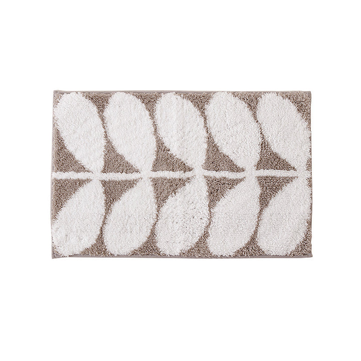 Fluffy bath mat with abstract wave pattern and non-slip back