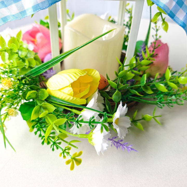 Decorative table lantern with artificial flowers and ribbon Bowlift