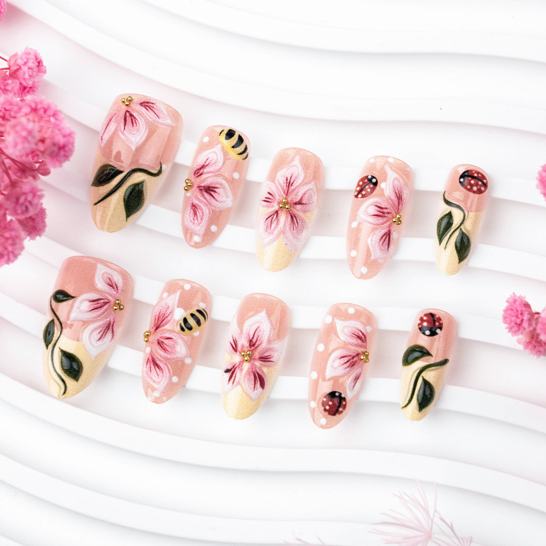 Artificial nail set with floral 3D applications and gloss finish Bowlift