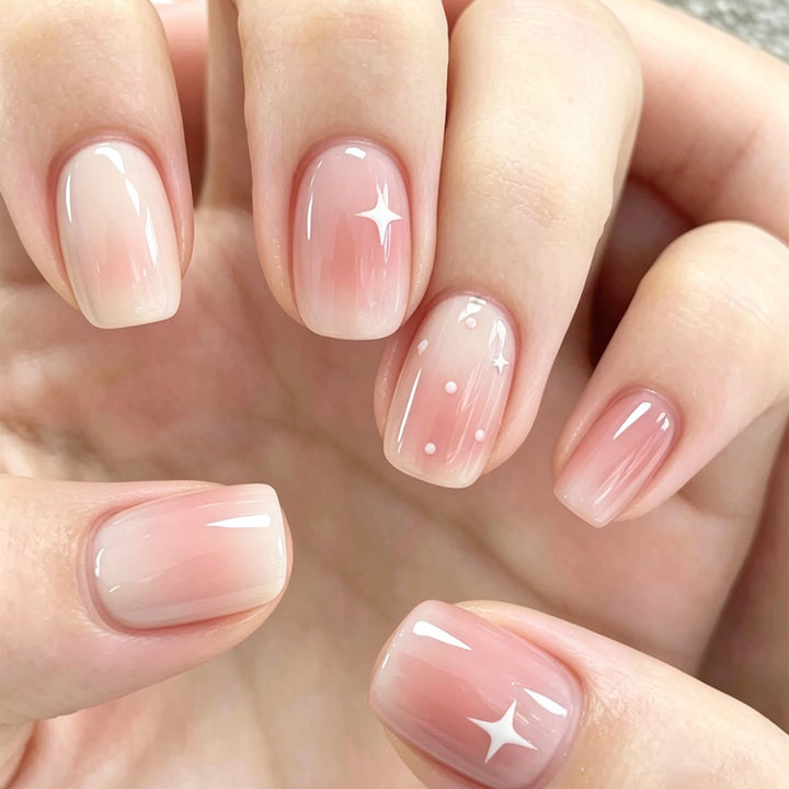 Nail art with ombre effect and glitter accents Bowlift