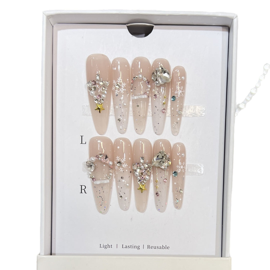 Artistic Press-On Nail Set with Snowflake and Gemstone Designs Bowlift