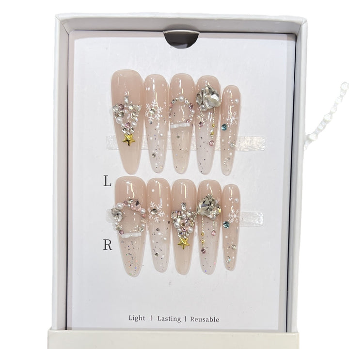 Artistic Press-On Nail Set with Snowflake and Gemstone Designs Bowlift
