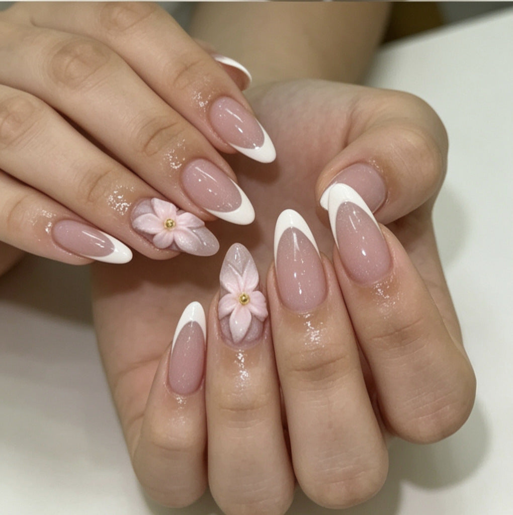 Artificial nails with floral decoration and elegant French tip design Bowlift