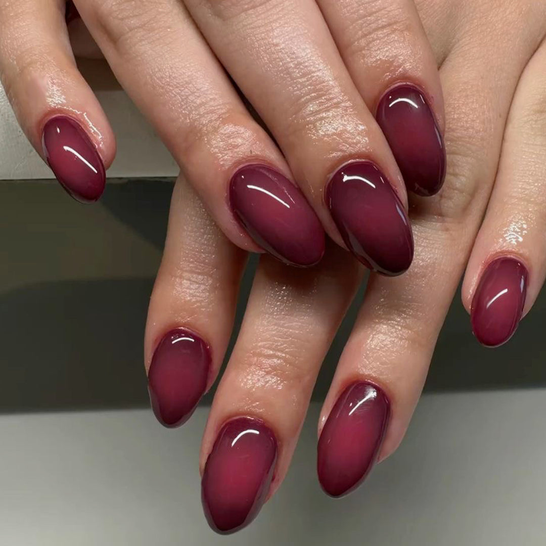 Elegant Stiletto Nails with Gentle Gradient Bowlift