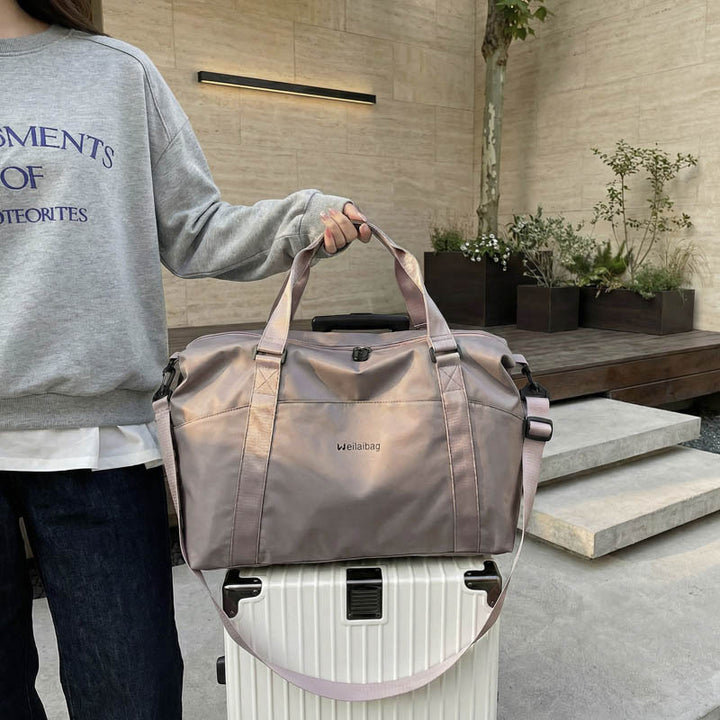 Multifunctional Sports And Travel Bag With Structured Surface Bowlift