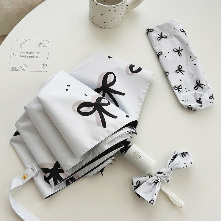 Women’s Folding Umbrella with Playful Bow Pattern Bowlift
