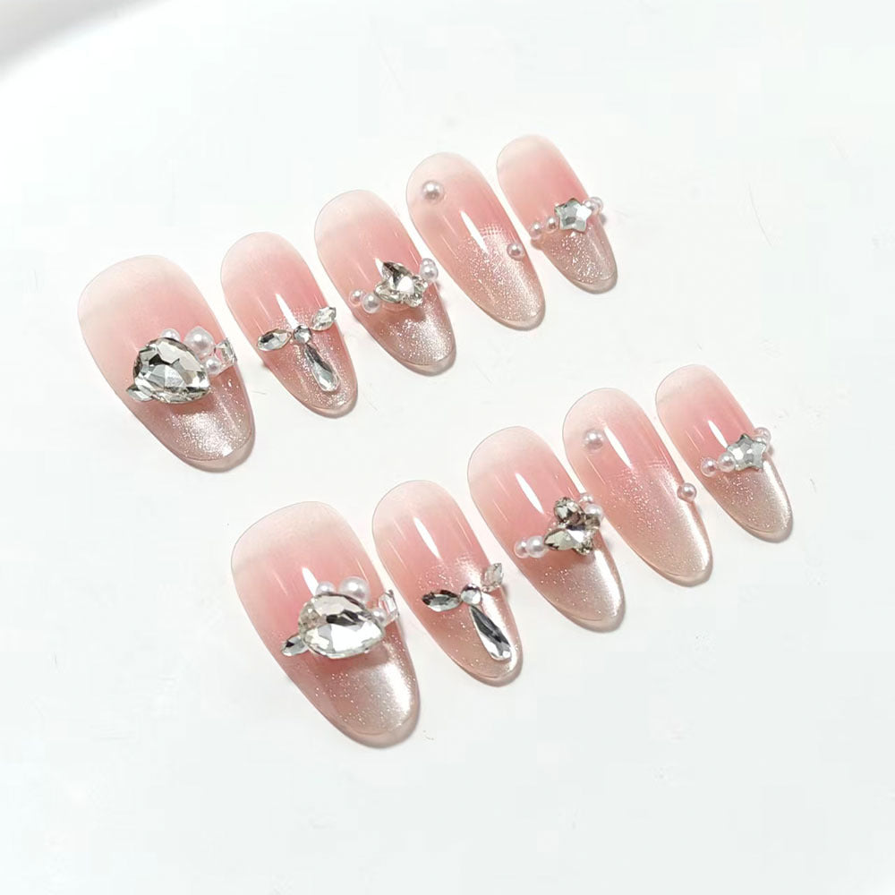 Artificial nails with luxurious jewelry accents Bowlift