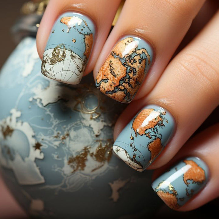 Creative artificial nails with world map inspired design Bowlift