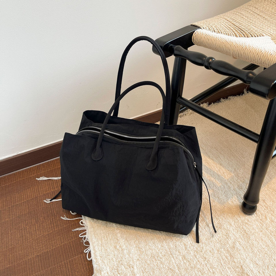 Elegant and Multifunctional Handbag Bowlift