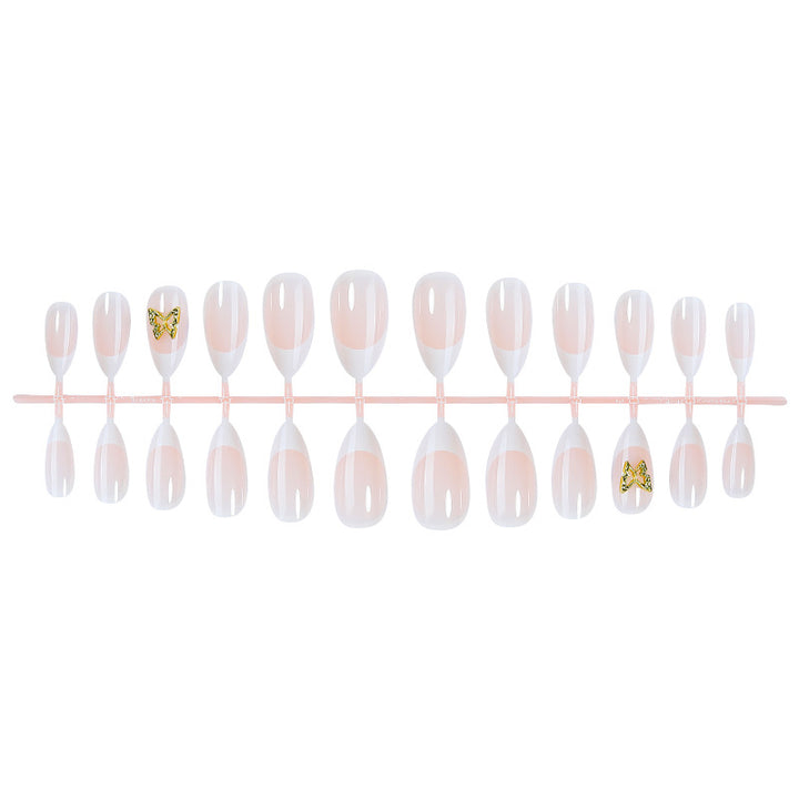 Fashionable Press-On Nail Set with Elegant French Tips and Decorative Accents Bowlift