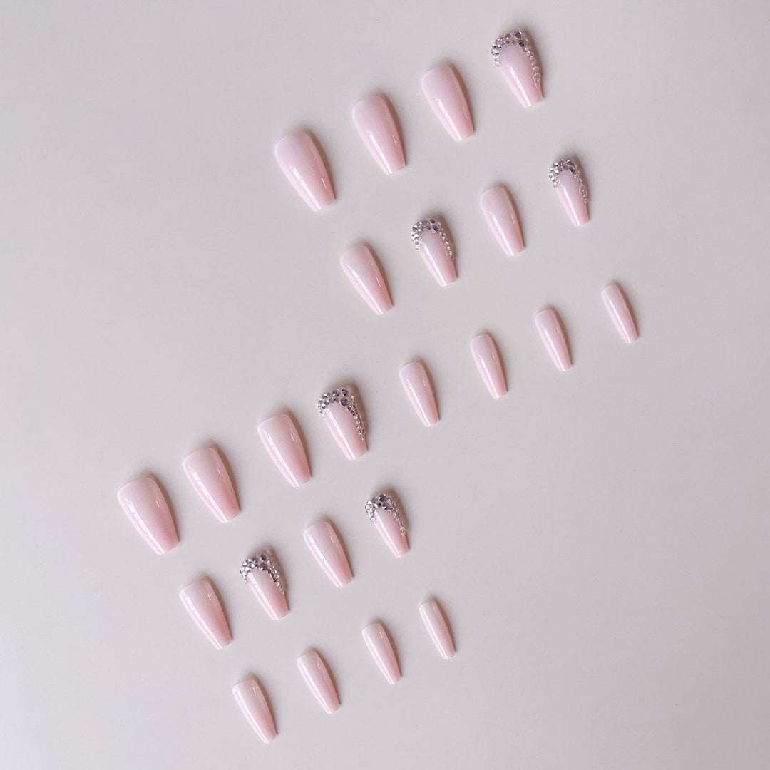 Artificial nail set with glamorous rhinestone embellishments Bowlift