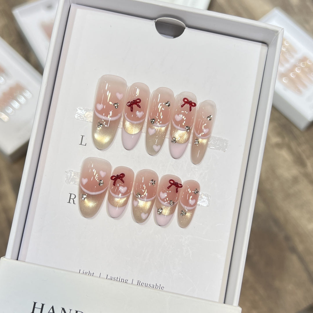 Decorative Press-On Nail Set with Heart and Bow Accents Bowlift