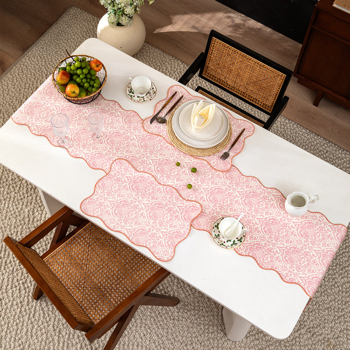 Elegant table runner with wavy hem and baroque damask pattern