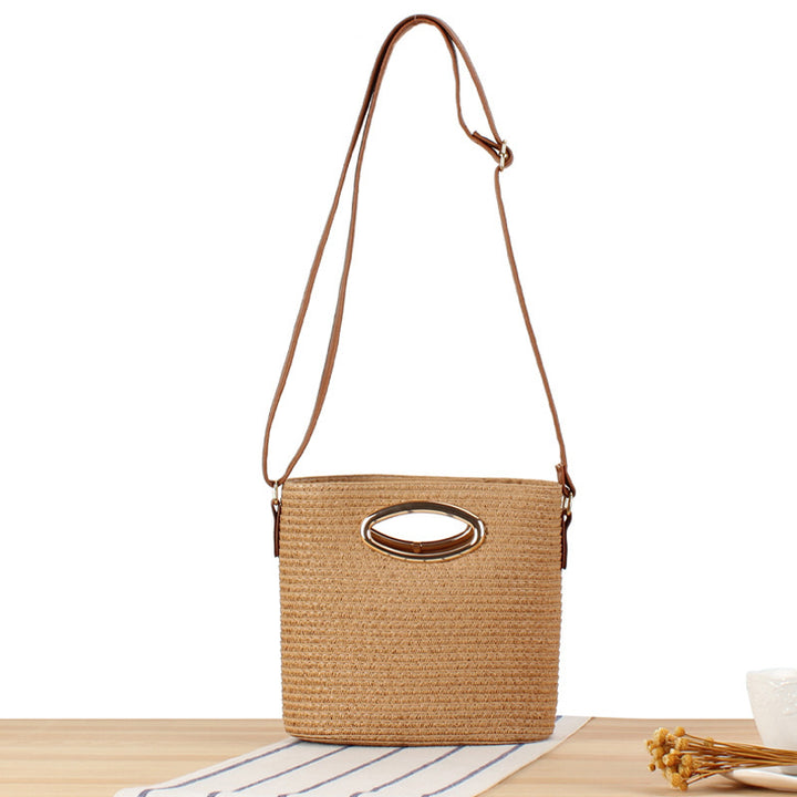 Shoulder bag made of hand-woven natural material with elegant ring closure Bowlift