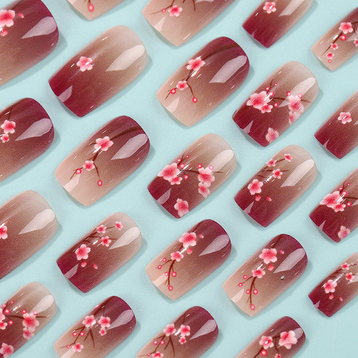 Artificial nails set with floral accents Bowlift