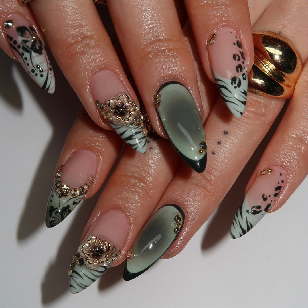 Artful Stiletto Fingernails with Floral and Geometric Decorations Bowlift