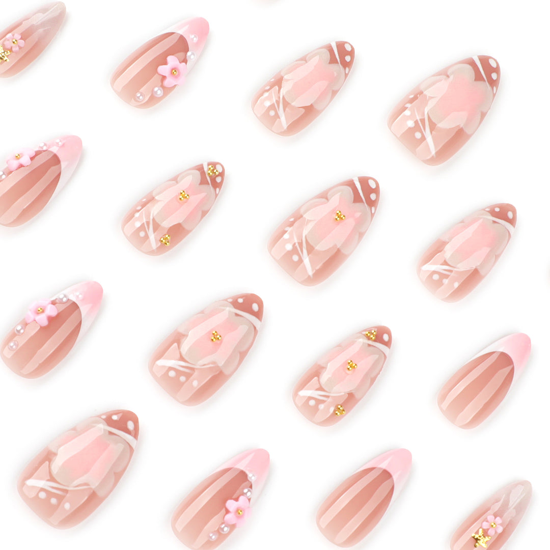 Artful nail extensions with floral patterns and glitter accents Bowlift
