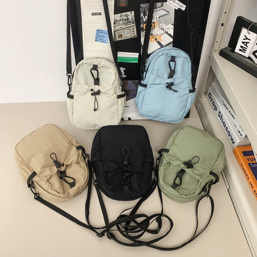 Practical crossbody backpack with multifunctional compartments Bowlift