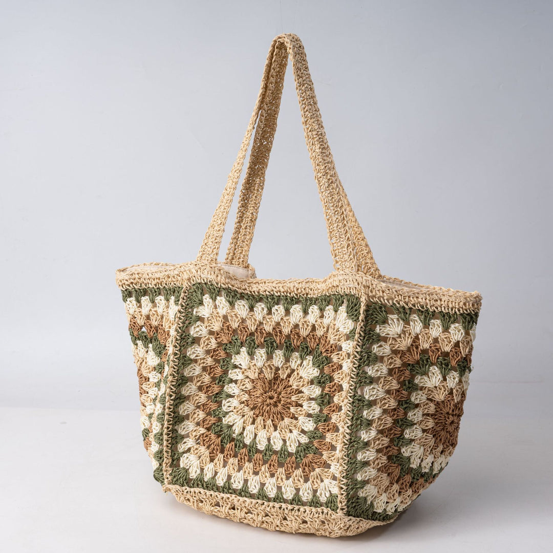 Beach bag made of hand-woven natural material with a square pattern Bowlift