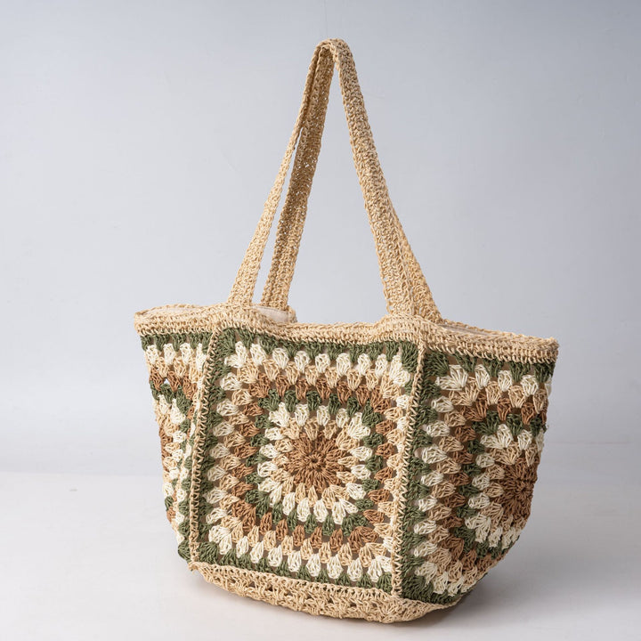 Beach bag made of hand-woven natural material with a square pattern Bowlift