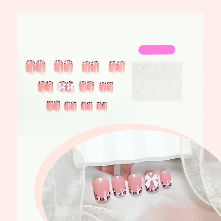 Artifical Nail Set with Elegant Paw and Bow Accents Bowlift